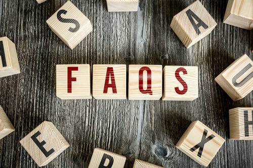 Wooden Blocks with the text: Faqs
